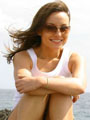 Carla by the sea in a denim miniskirt. Only Carla: Carla