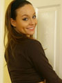 Carla in a lovely brown skirt and crop top. Only Carla: Carla